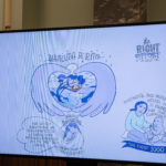 Āhurutia te rito | It takes a village graphic on a TV screen